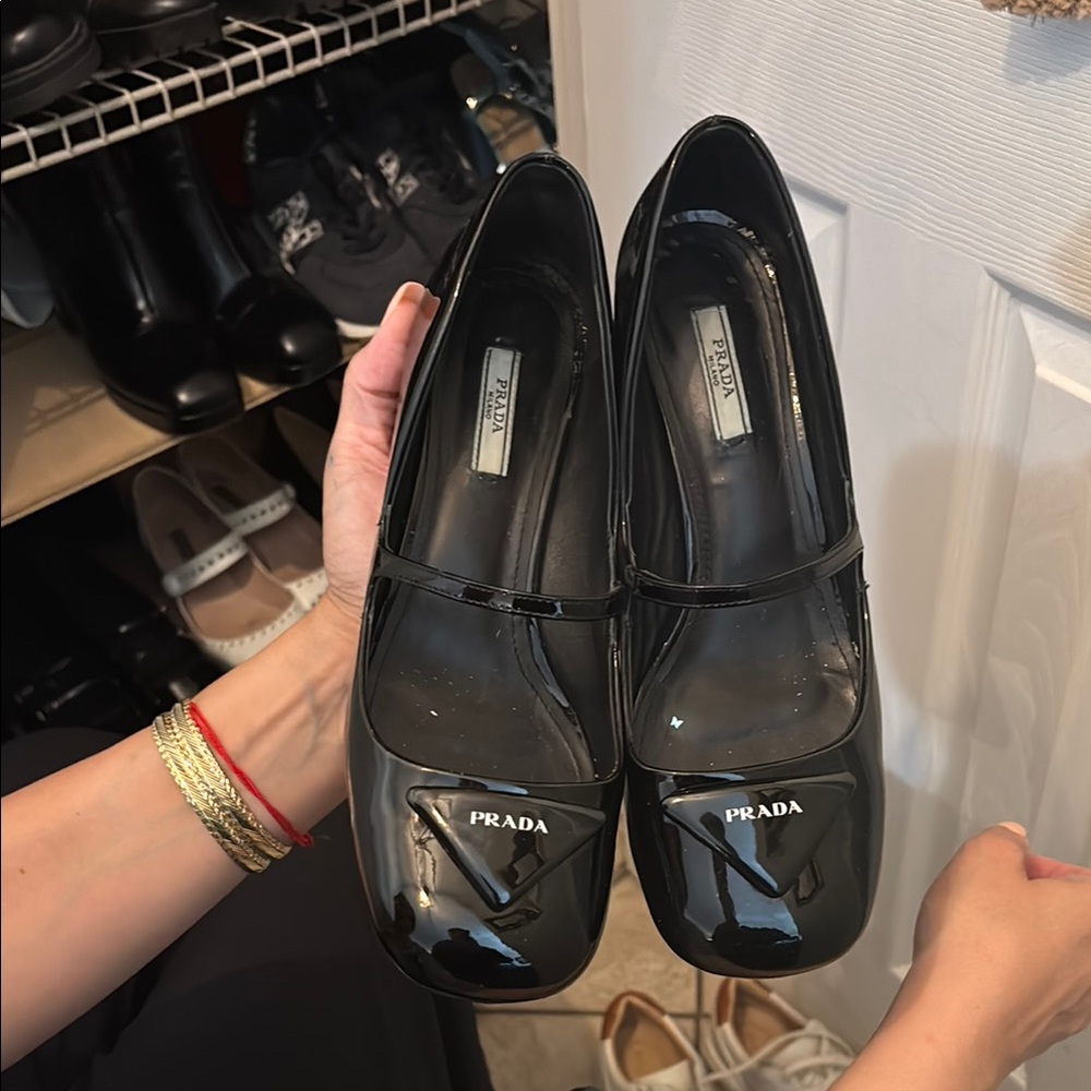 Prada Black Flats with Sleek Glossy Finish